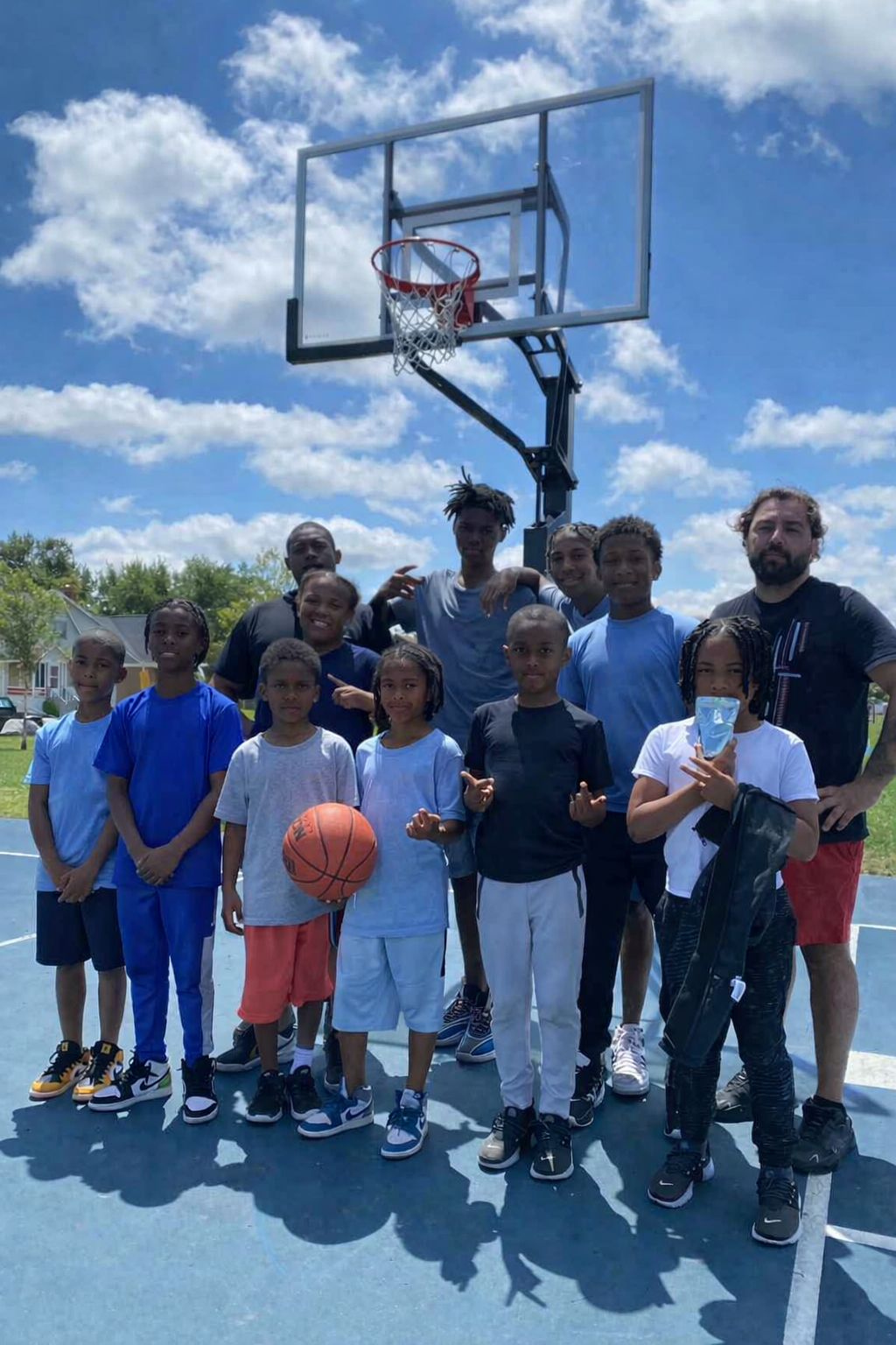 Youth R Us basketball team on the court in Detroit